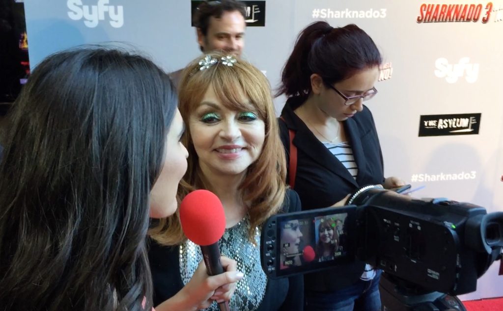 Judy Tenuta being interviewed on the red carpet