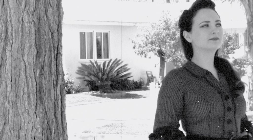 Actress Lauren Baldwin in black and white