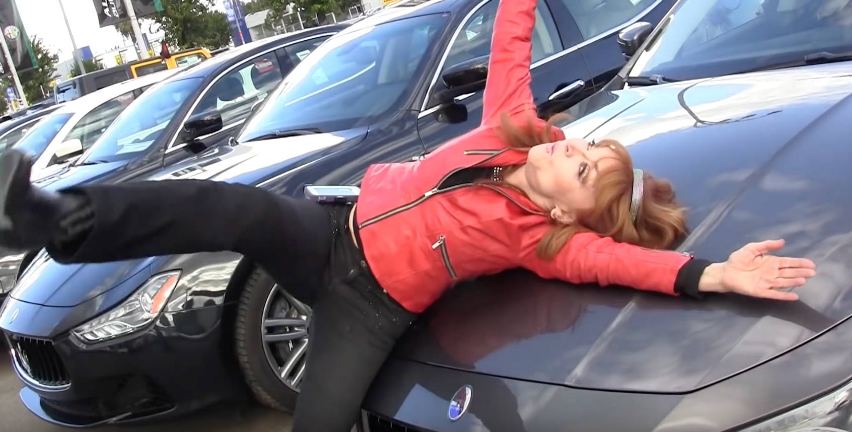 Comic Judy Tenuta test driving a Maserati for a segment of "The World Accordion to Judy."